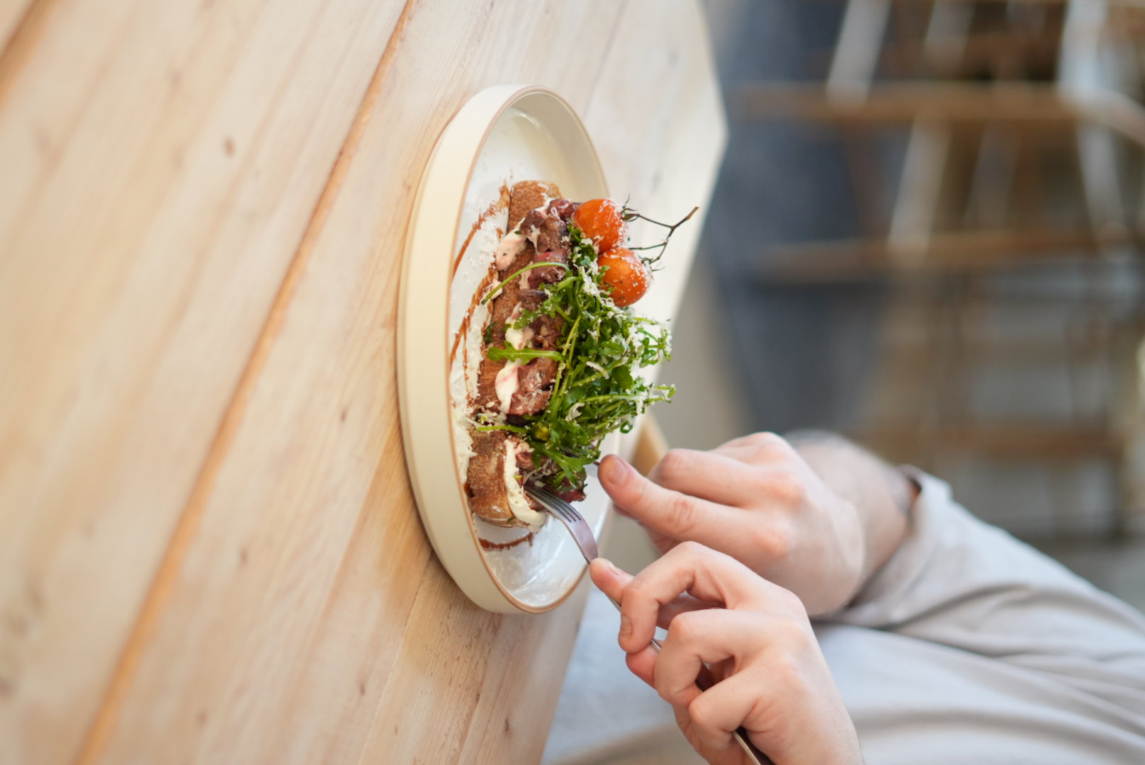 Steak sourdough plated with tomatoes
